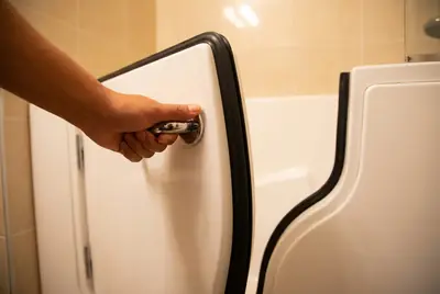 The inward opening door of a walk-in tub